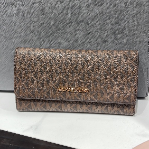 Michael Kors Handbags - MICHAEL KORS JET SET TRV LARGE TRIFOLD Brown
